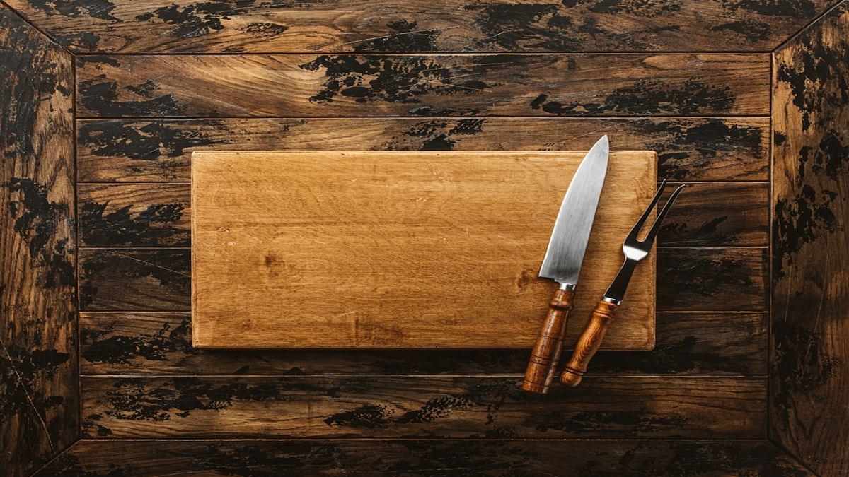 plant-based pantry staples — assorted nuts seeds and olive oil on wooden surface