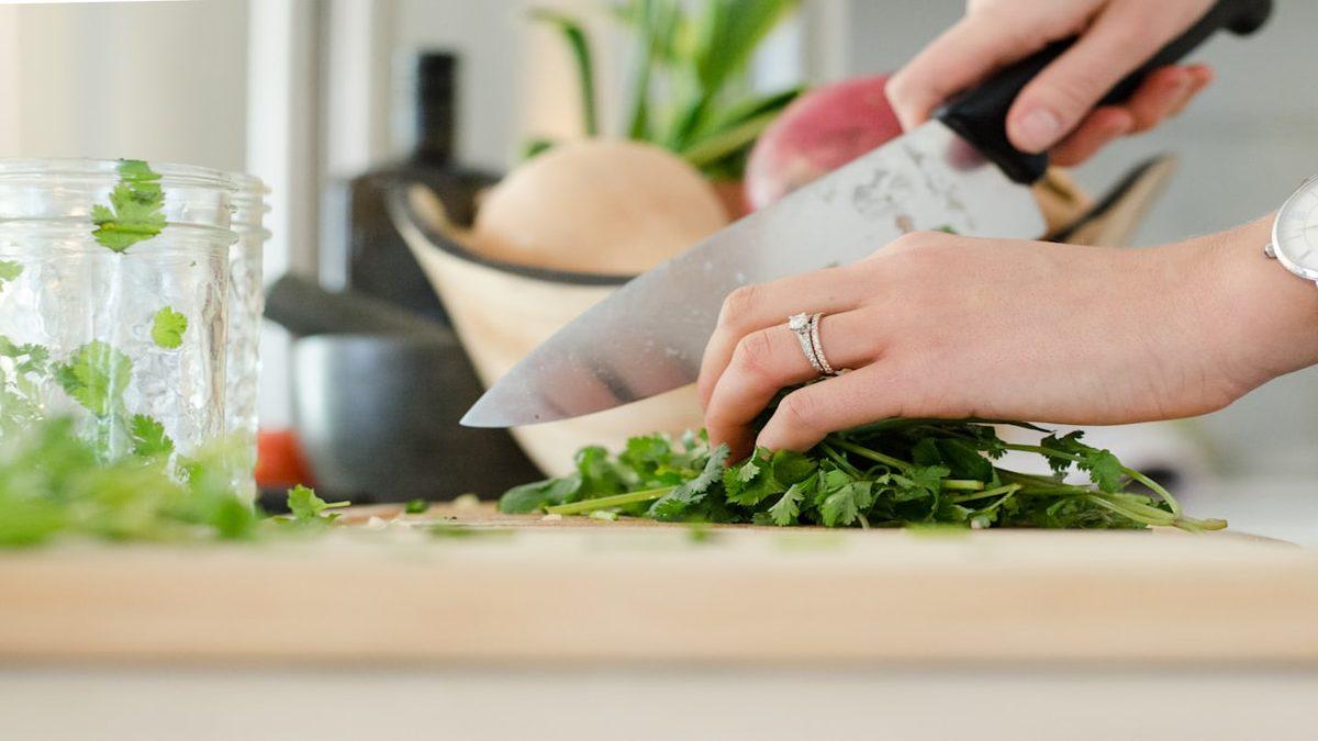 plant-based prep tools — wooden cutting board with fresh vegetables