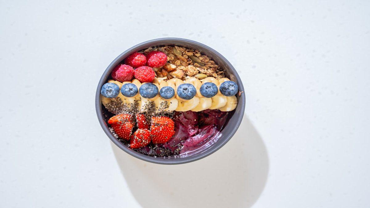 small appetite eating — colorful smoothie bowl with fresh berries