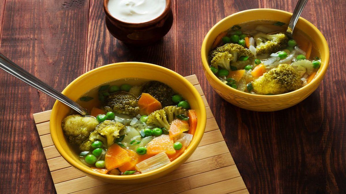 small appetite eating — warm vegetable soup in ceramic bowl