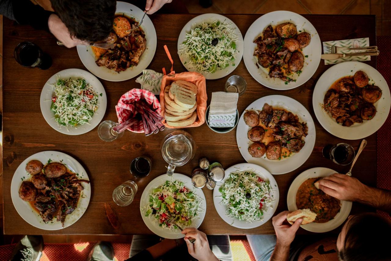 transition family to plant-based meals — colorful dinner spread on table