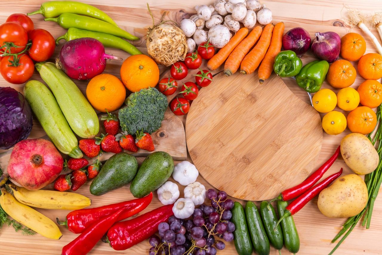 simplify healthy eating — fresh colorful vegetables arranged on a wooden cutting board