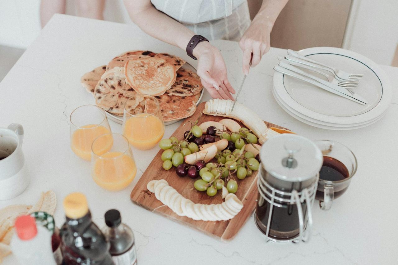 build a balanced plate — woman preparing fresh ingredients in bright kitchen