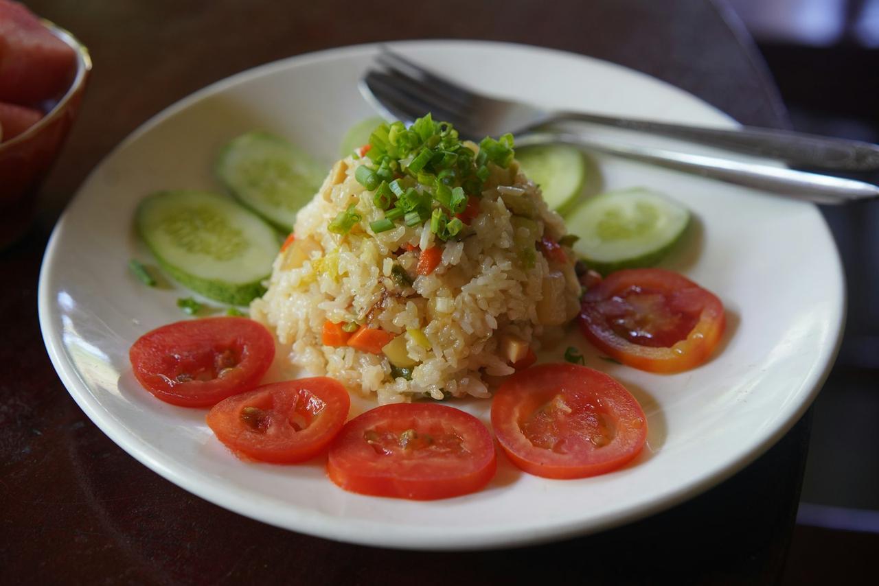 build a balanced plate — colorful vegetables and grains arranged on white dish